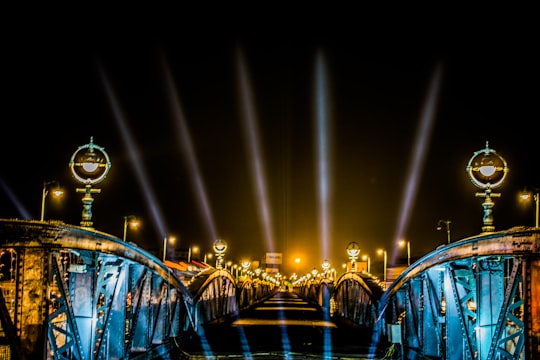 blue lights on bridge during night time in Ellis Bridge India