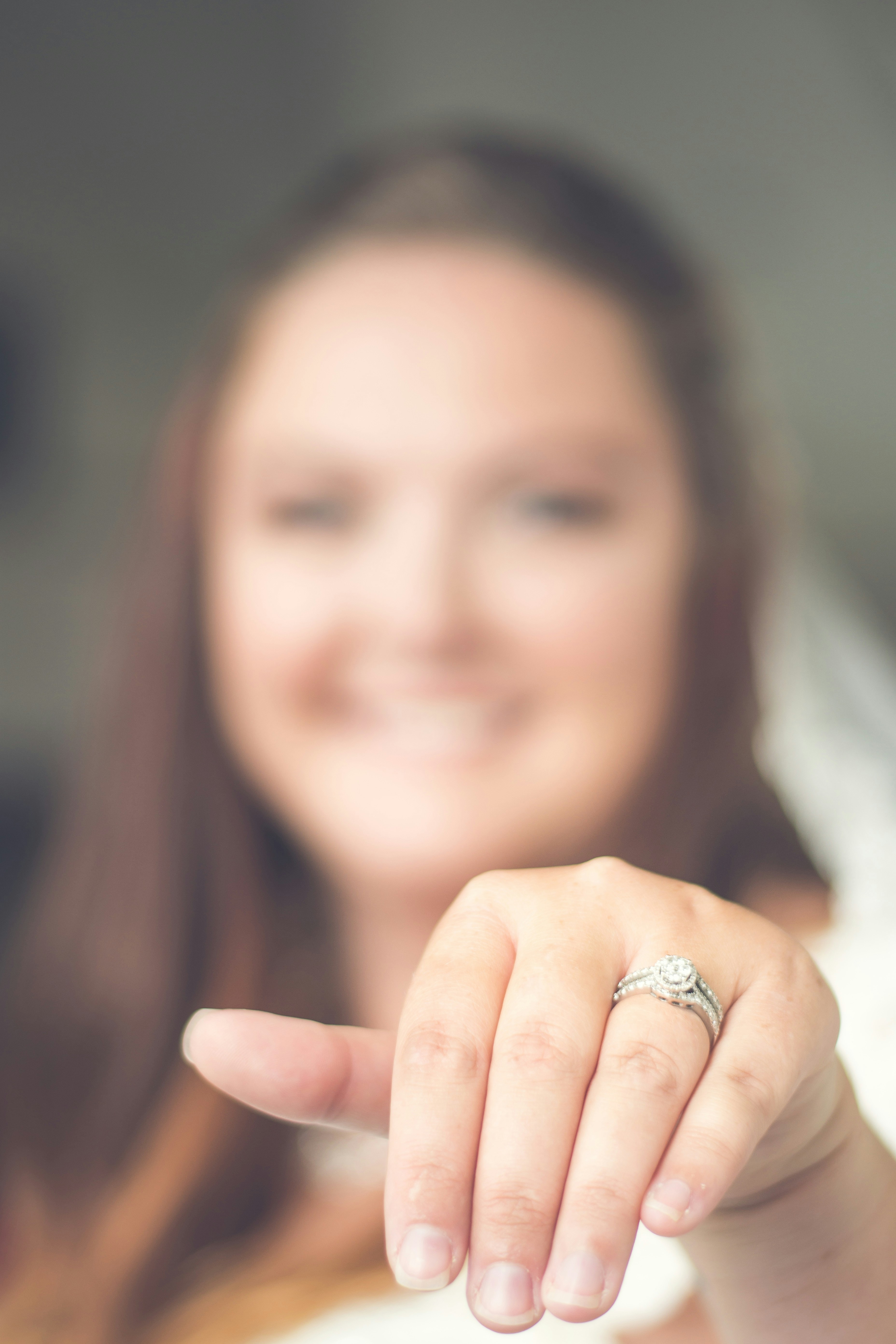 woman wearing silver diamond ring