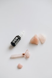white and black labeled bottle