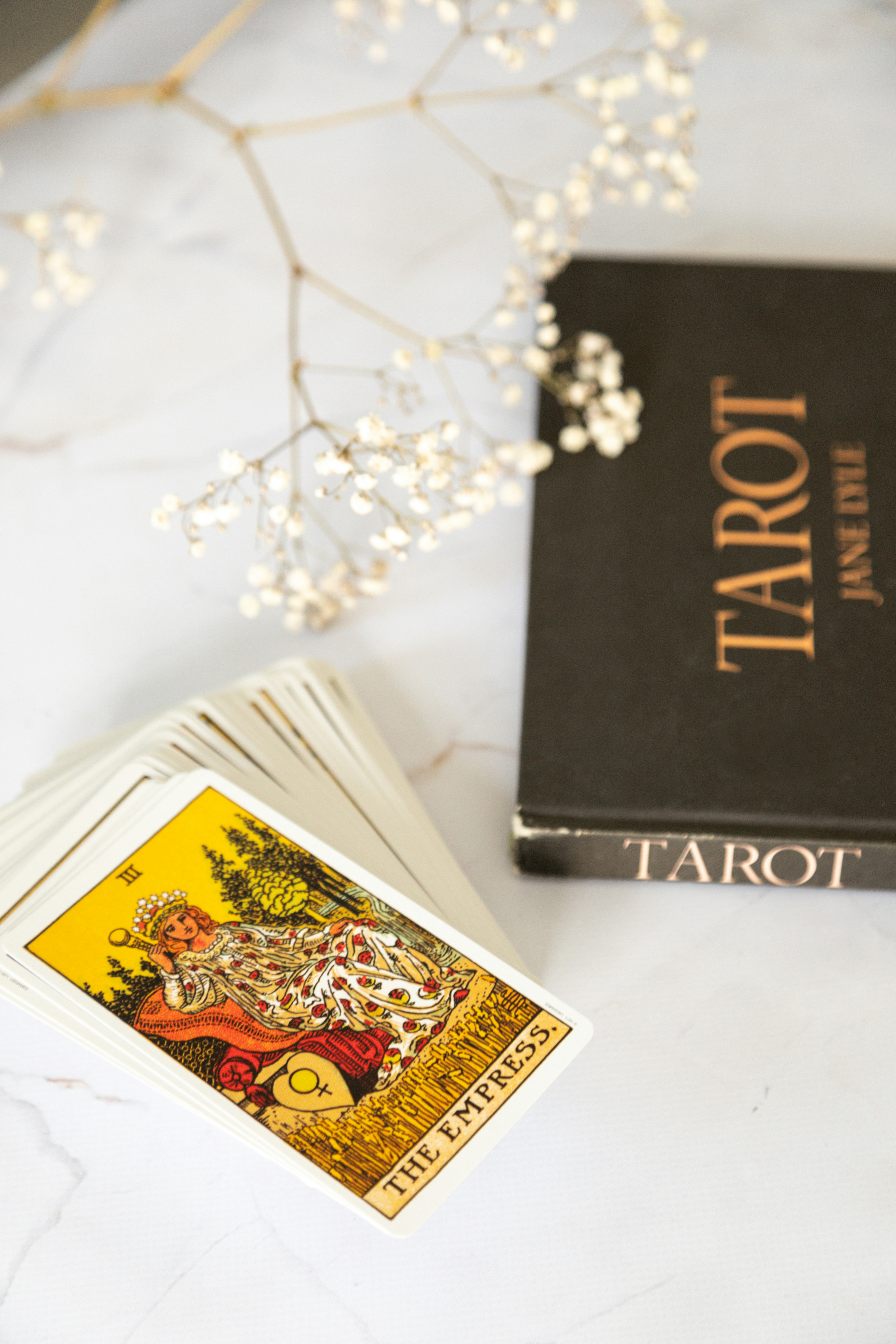 Tarot book with The Empress card from the Rider Waite Tarot deck