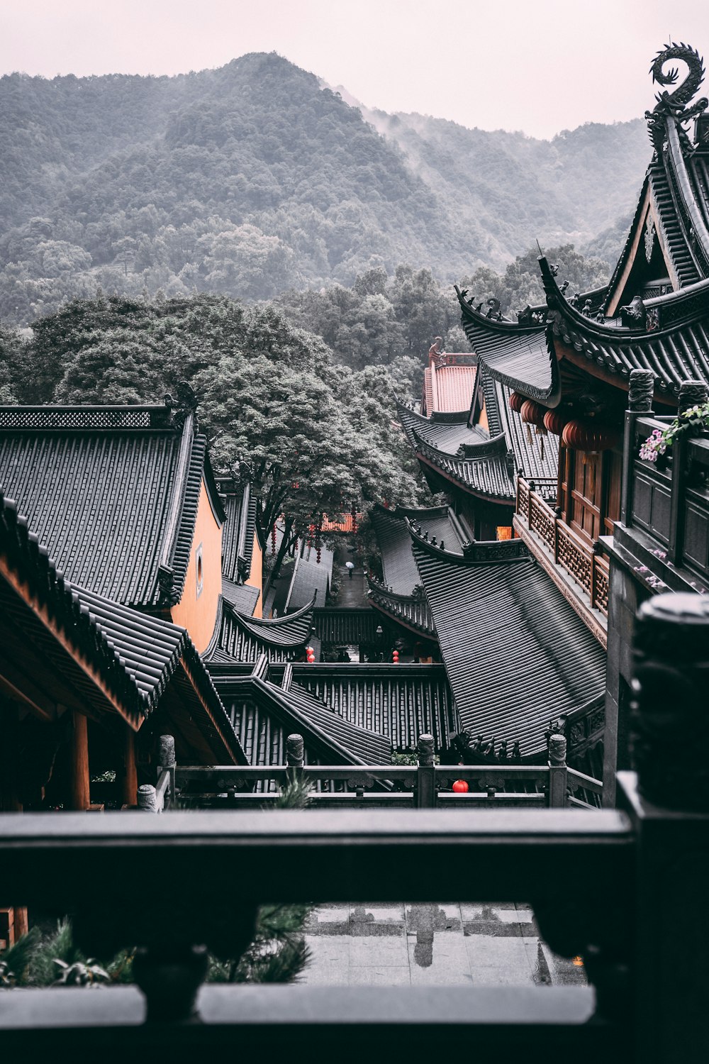 black and brown concrete house near mountain