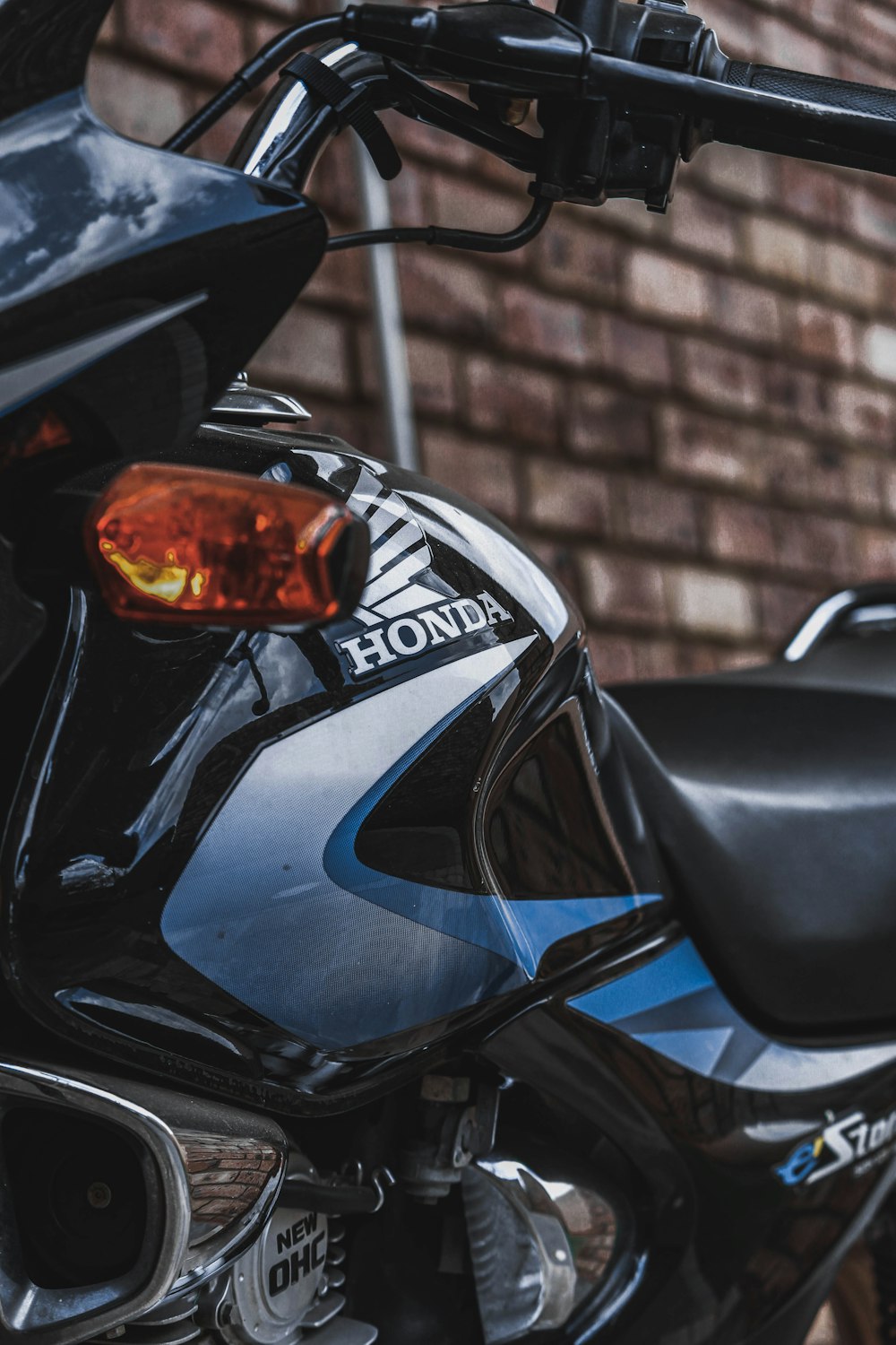 black and silver honda motorcycle