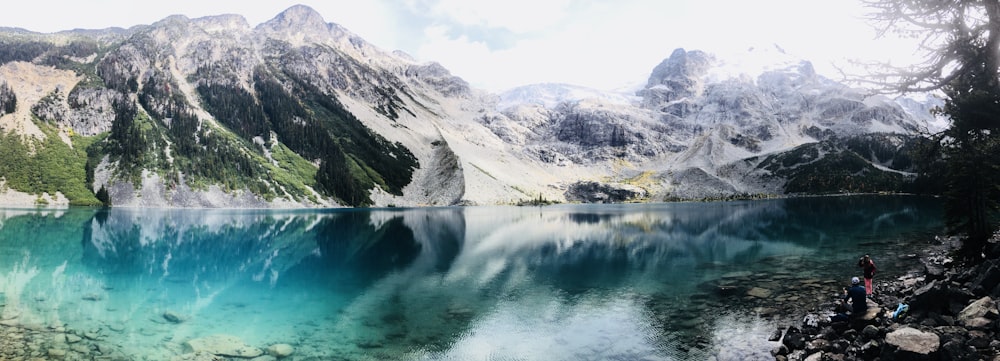 lake in the middle of mountains