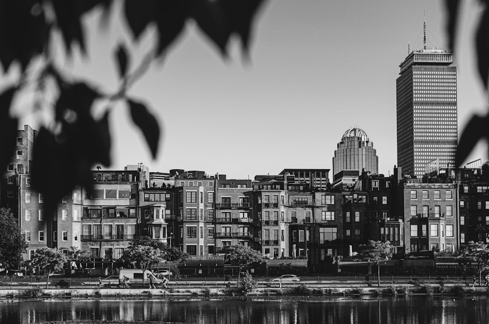 grayscale photo of city buildings