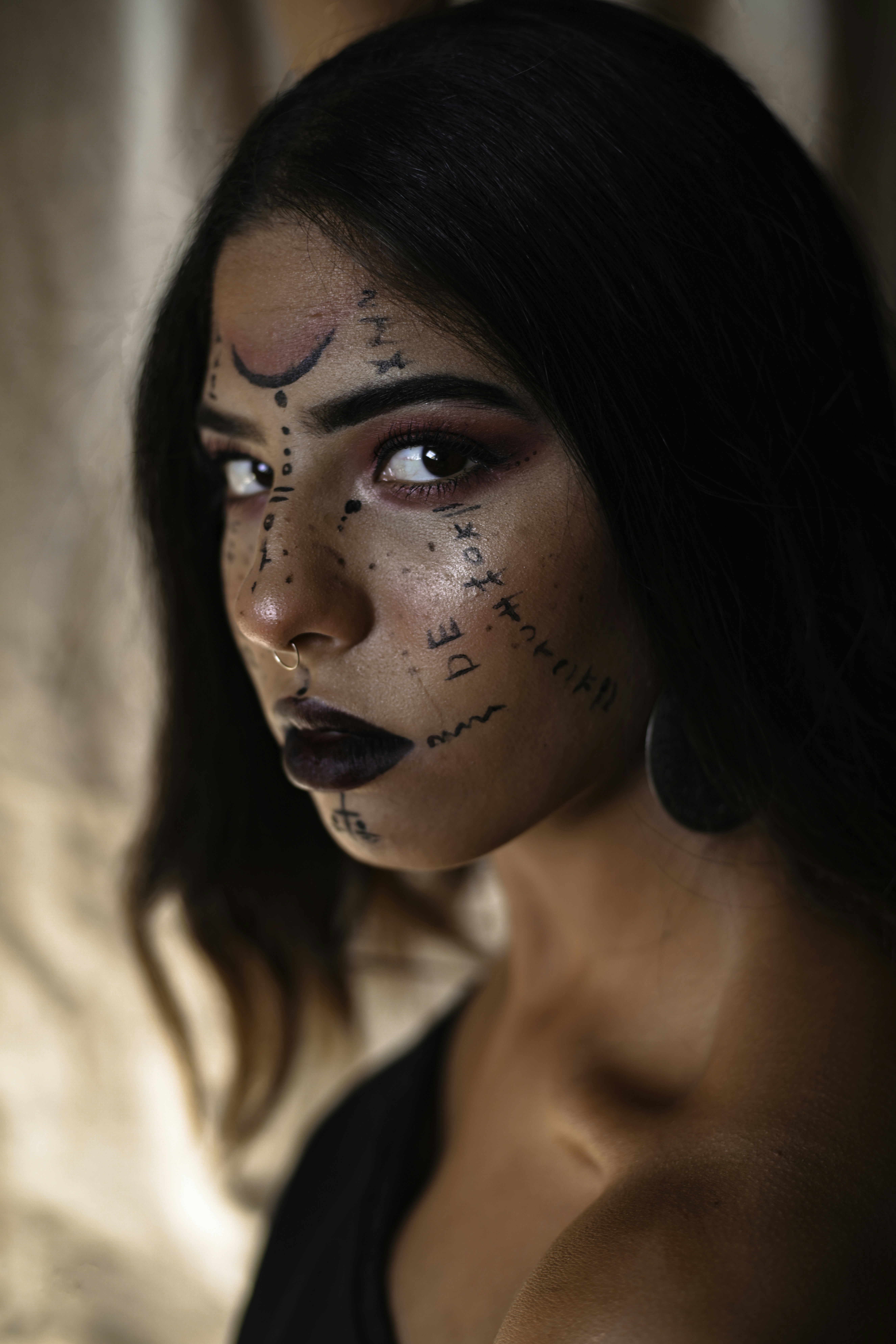 woman with black hair and red lipstick