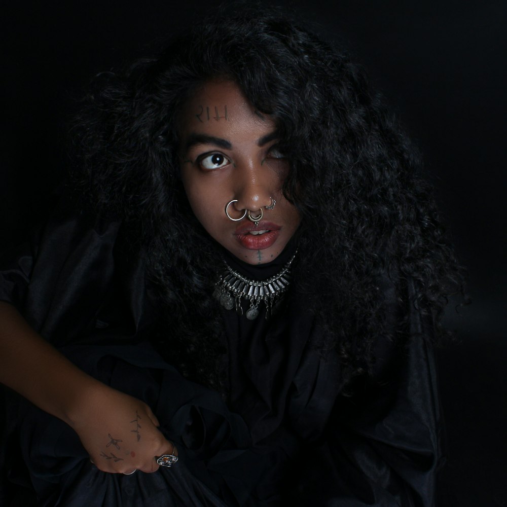 woman in black dress with red lipstick