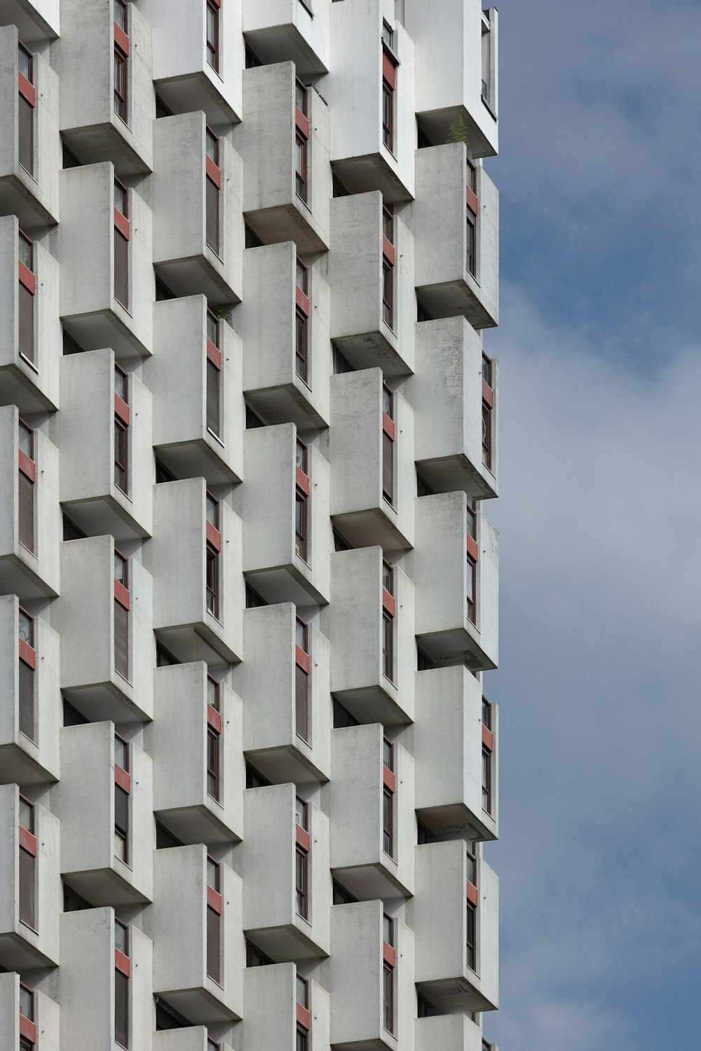 white concrete building under blue sky during daytime