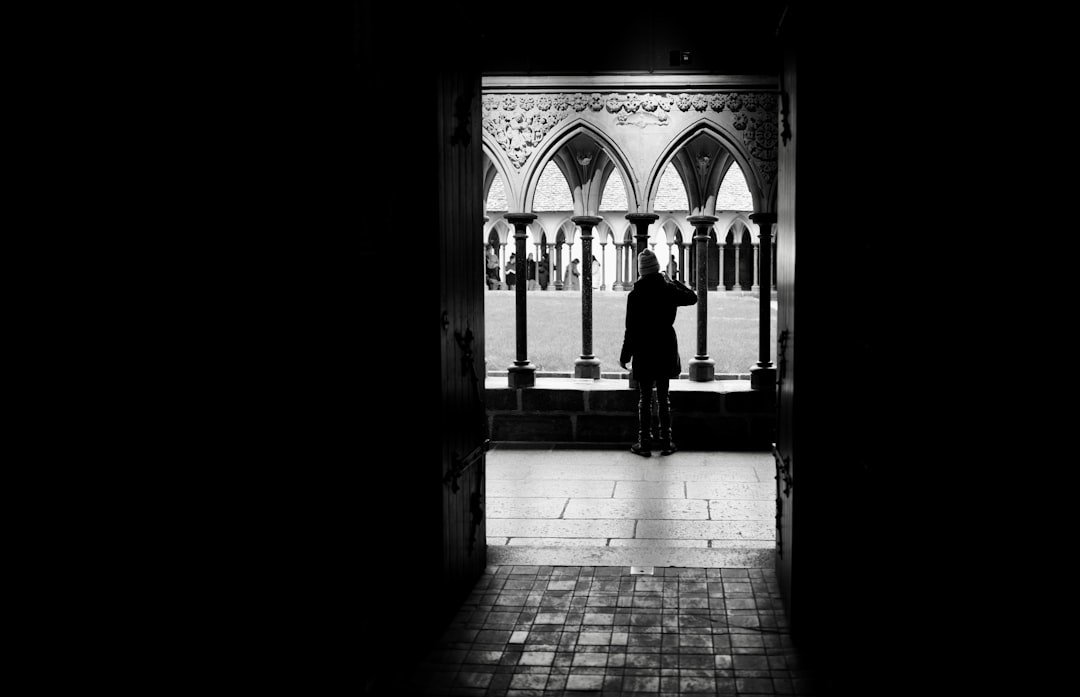 silhouette of people walking on hallway