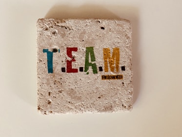 white and blue no smoking sign