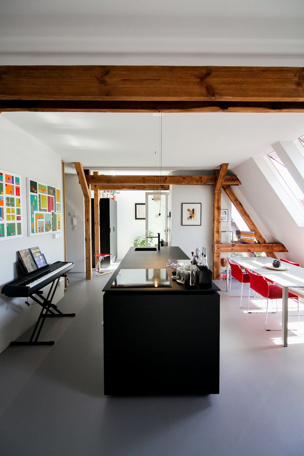 black wooden desk near white window curtain