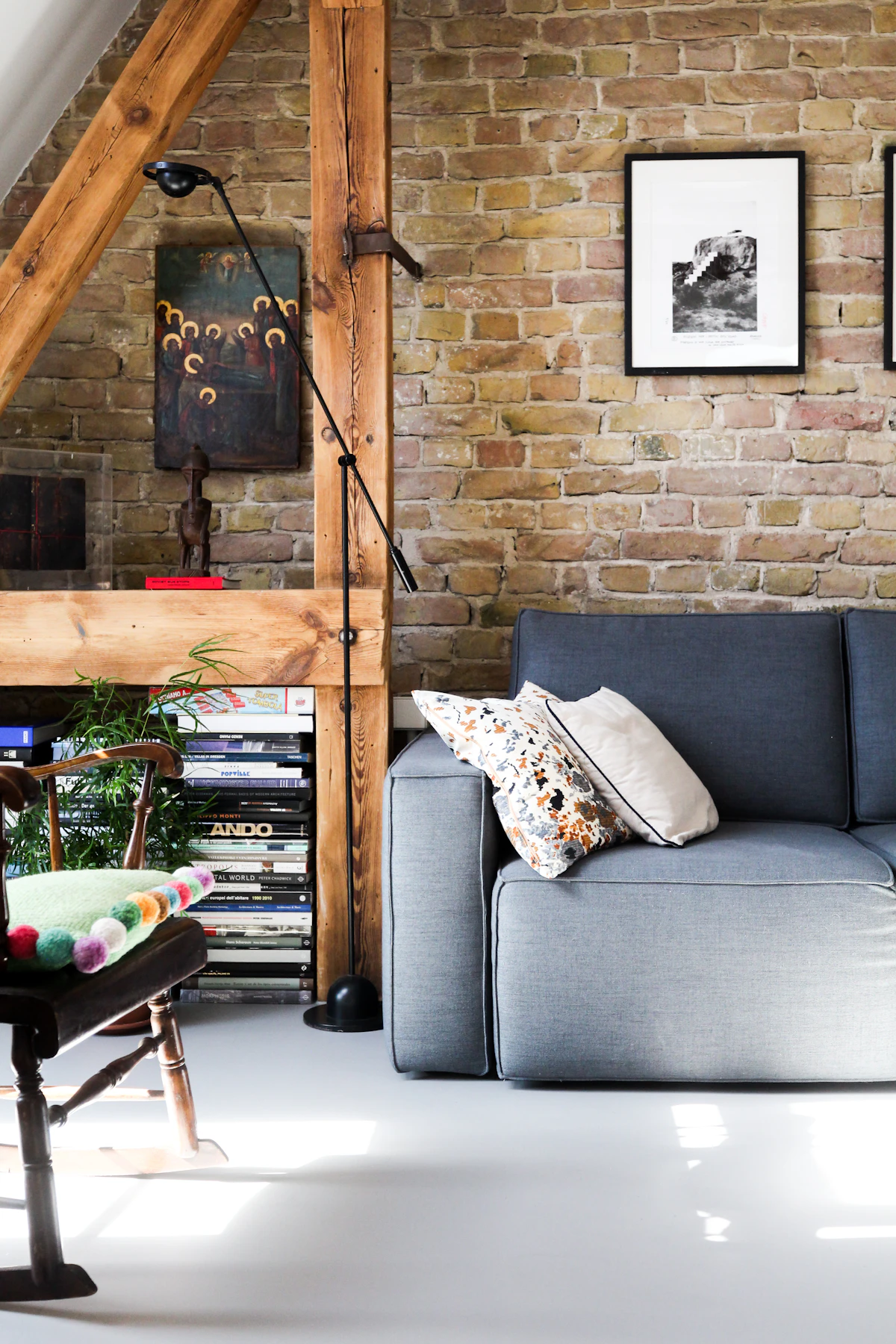 Bright city apartment living room with a gray sofa