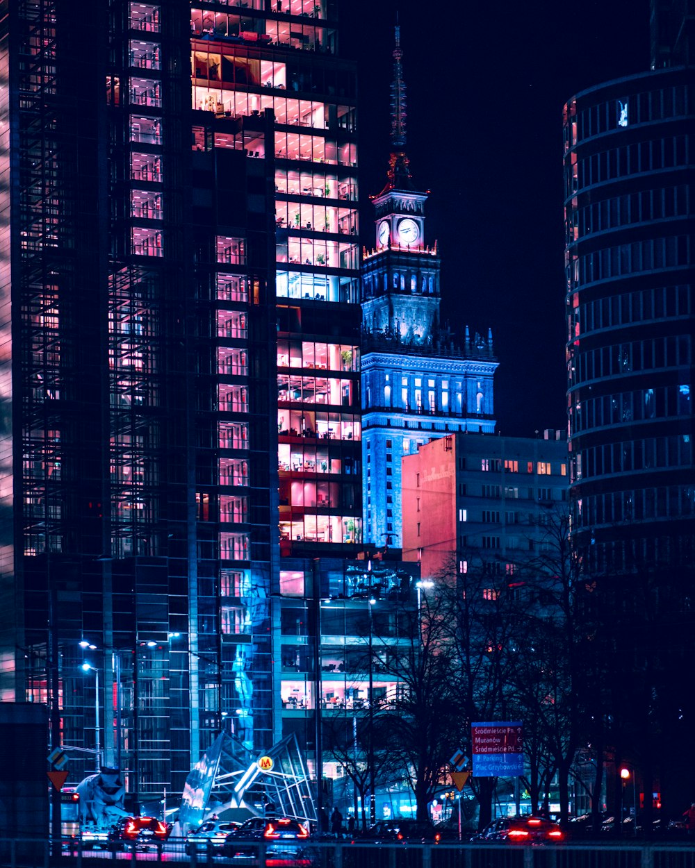 black and white concrete building during night time