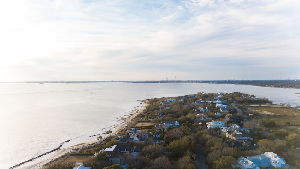 a bird's eye view of a neighborhood by the water