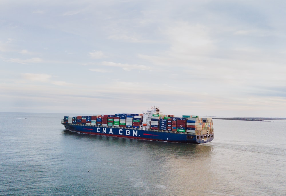 a large container ship sailing across a body of water