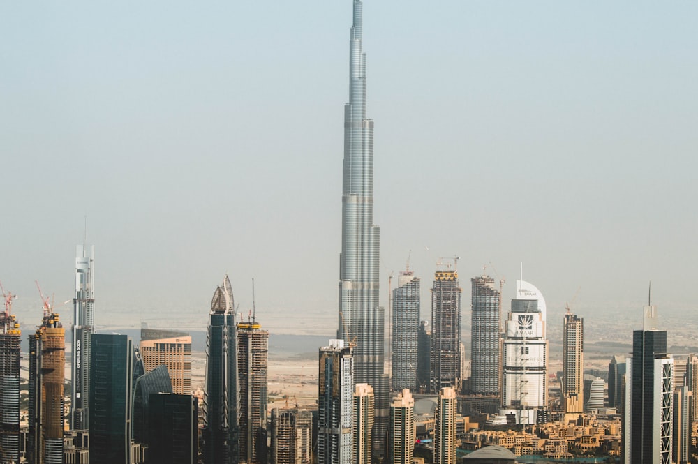 city skyline under white sky during daytime