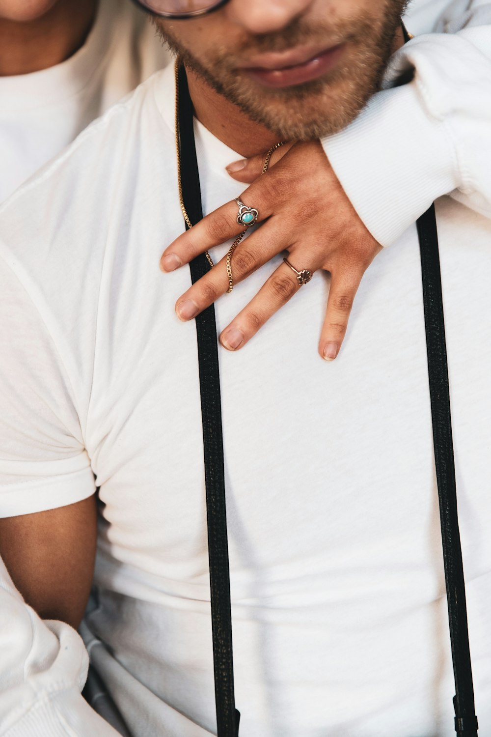 man in white polo shirt