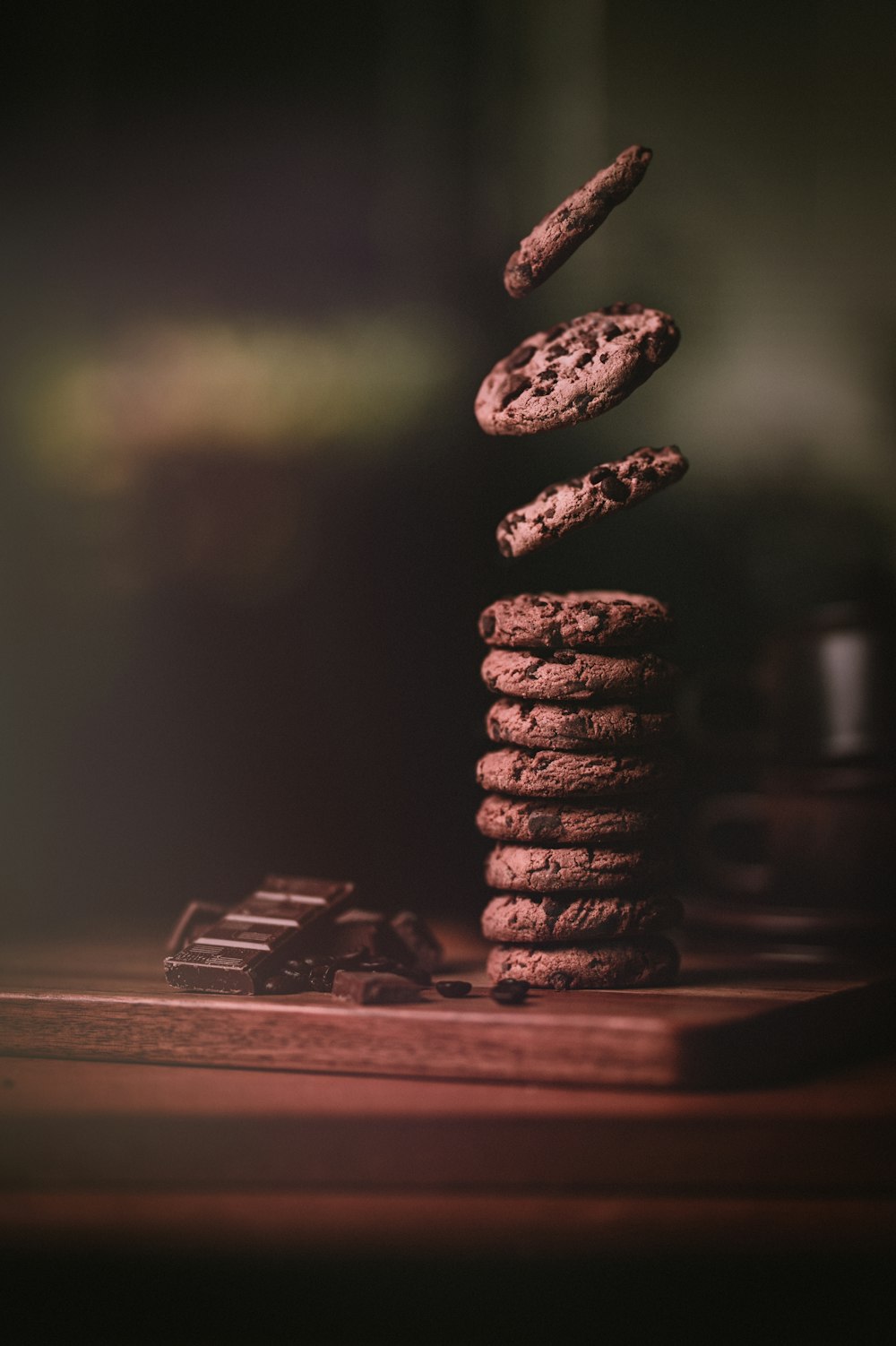 brown pine cone on white wooden table