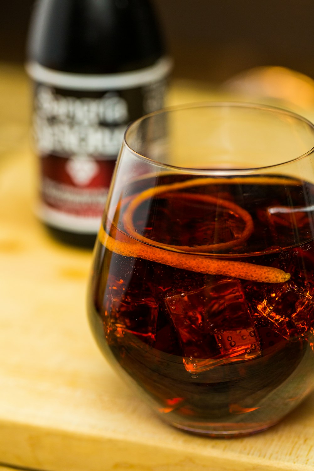 clear drinking glass with red liquid