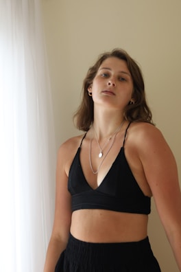 A model showcasing a layered look with a mint top.