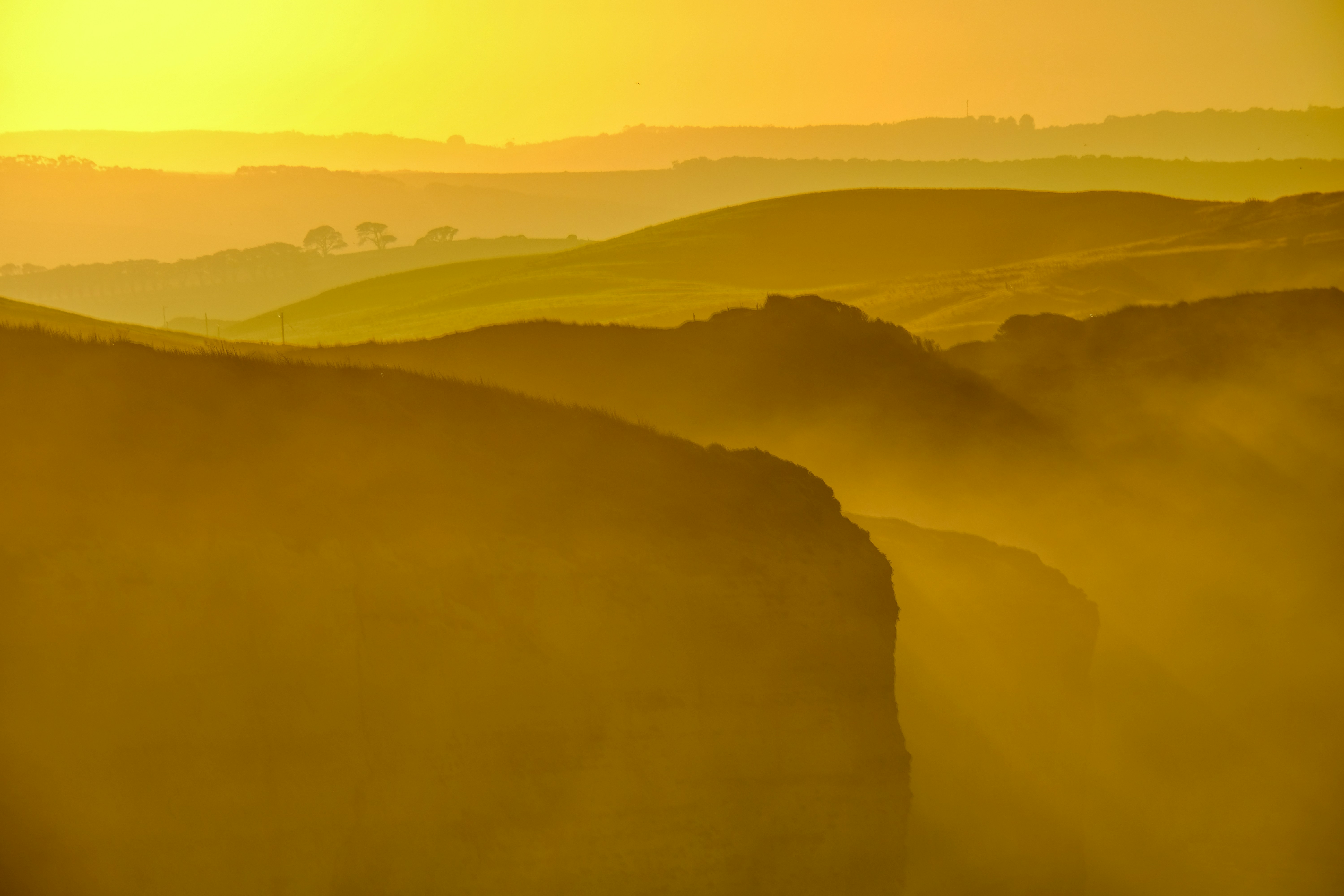 green mountains under white sky during daytime