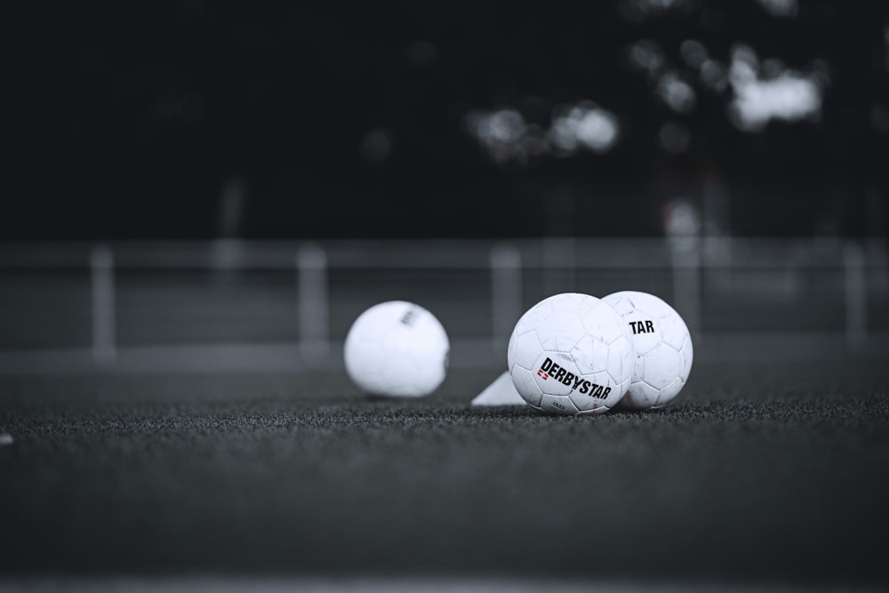 white soccer ball on field