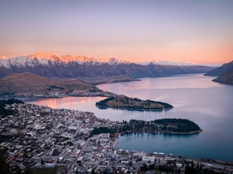 aerial view of lake and mountains during daytime
