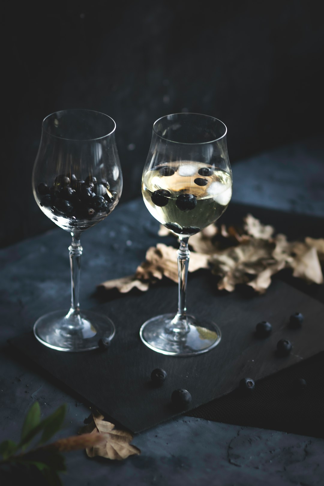 clear wine glass with yellow liquid