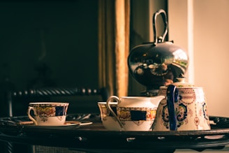 An elegant display of deluxe tea and coffee kits for gifting.