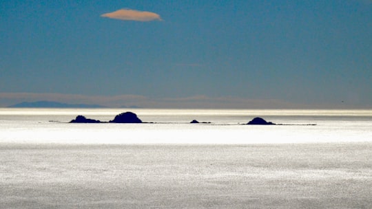 silhouette of mountain during daytime in Whakatane New Zealand