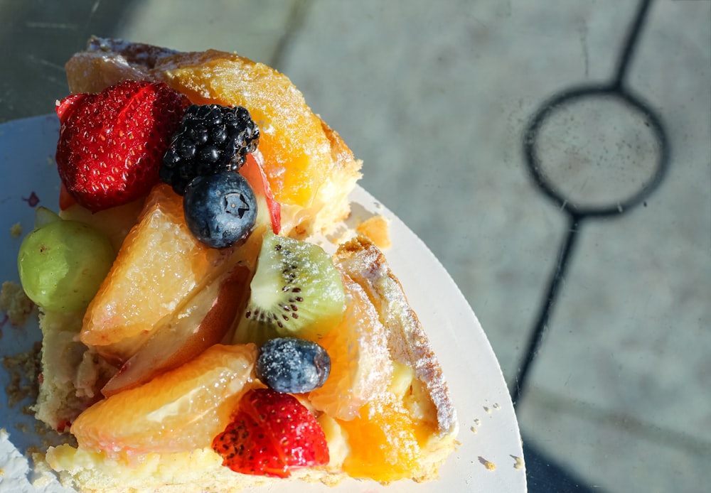 sliced fruit on white ceramic plate