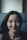 woman in black shirt smiling