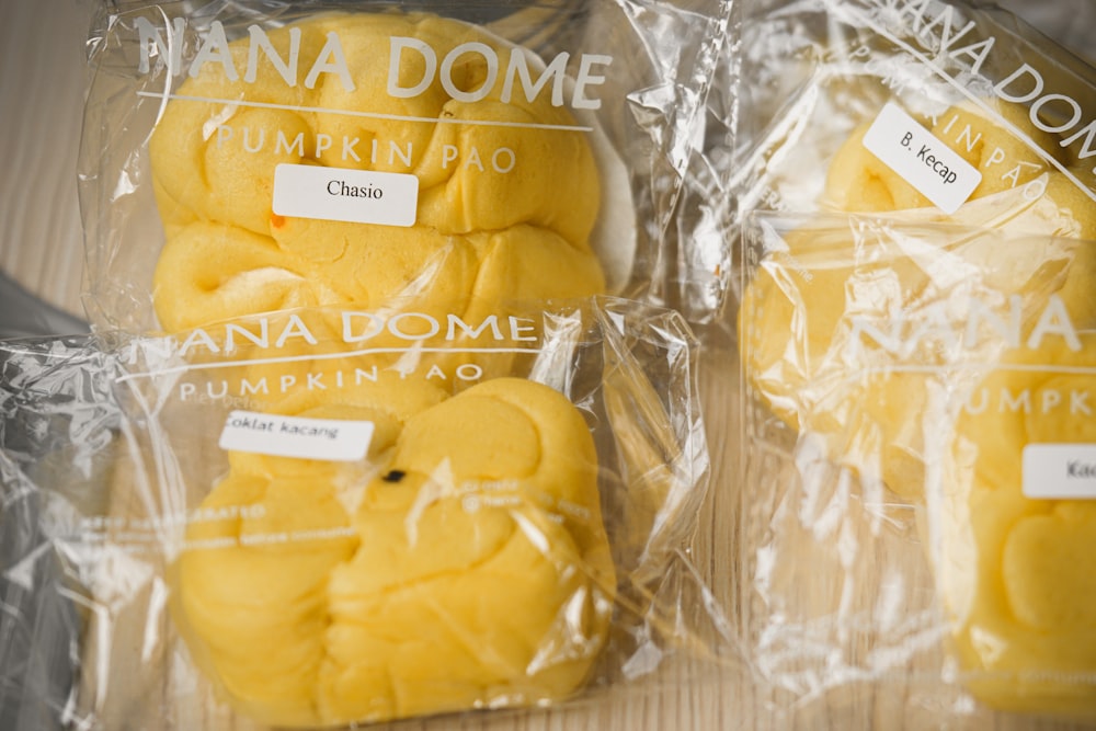 yellow bread in clear plastic pack