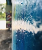 Close-up of a freshly painted concrete wall with vibrant, weather-resistant coating.
