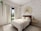 A stylish bedroom featuring lushlove's aesthetic accents.