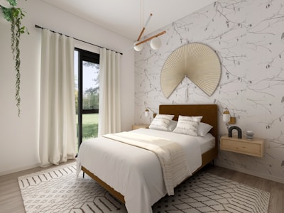 A serene bedroom with a stylish bed and calming decor.
