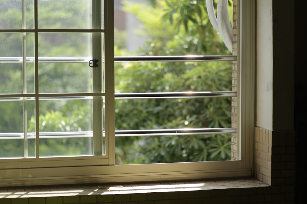 white wooden framed glass window