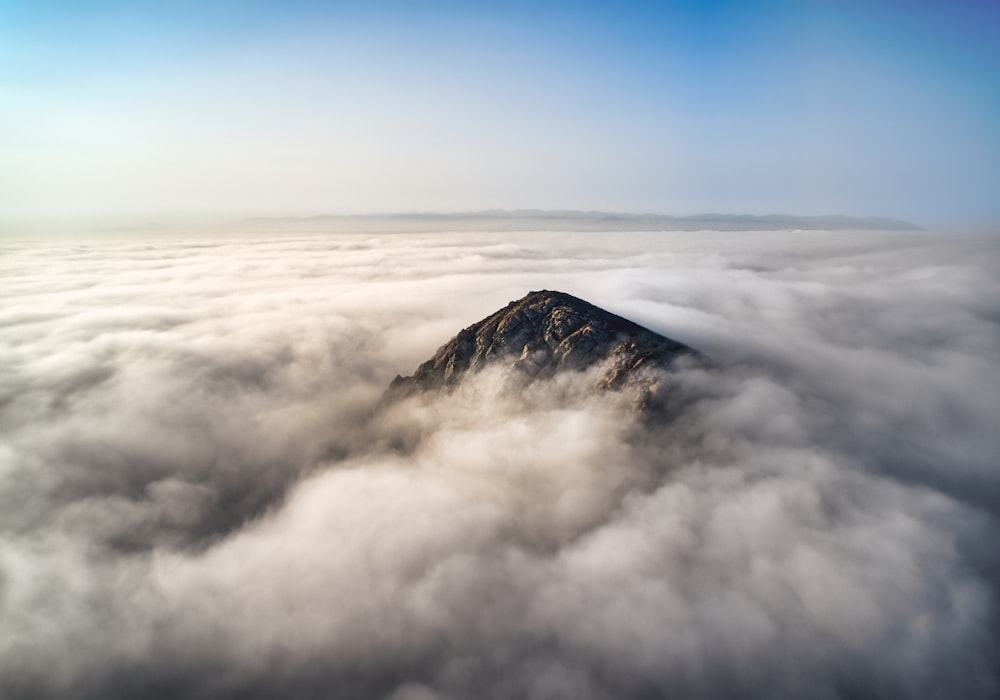 black and white mountain under blue sky during daytime