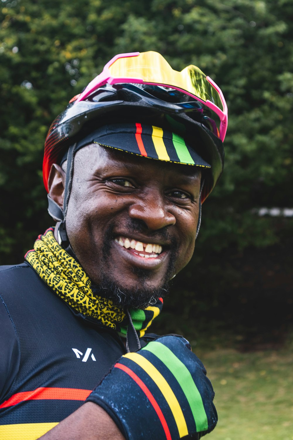 man in black and yellow jacket wearing black helmet