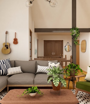 white and black sofa near brown wooden coffee table