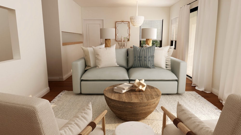 brown wooden round table near white sofa