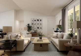 living room with white sofa set and green potted plant