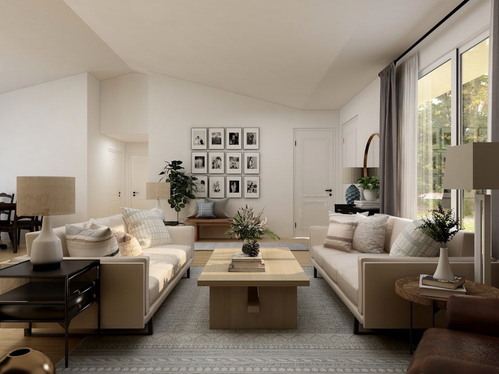 living room with white sofa set and green potted plant