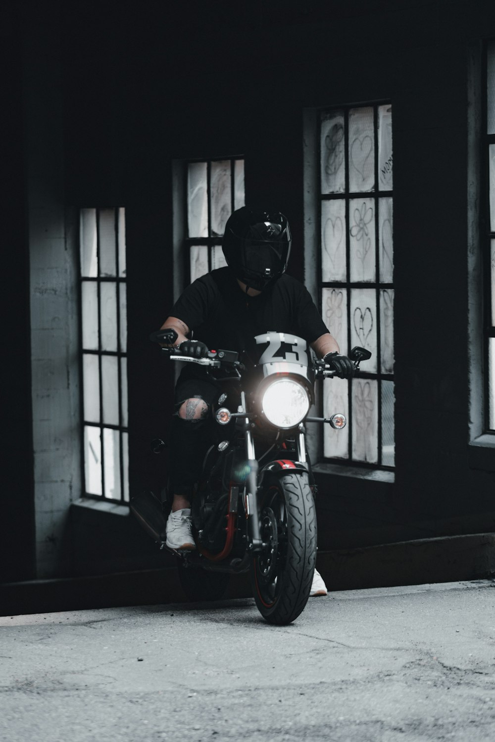 man in black helmet riding motorcycle