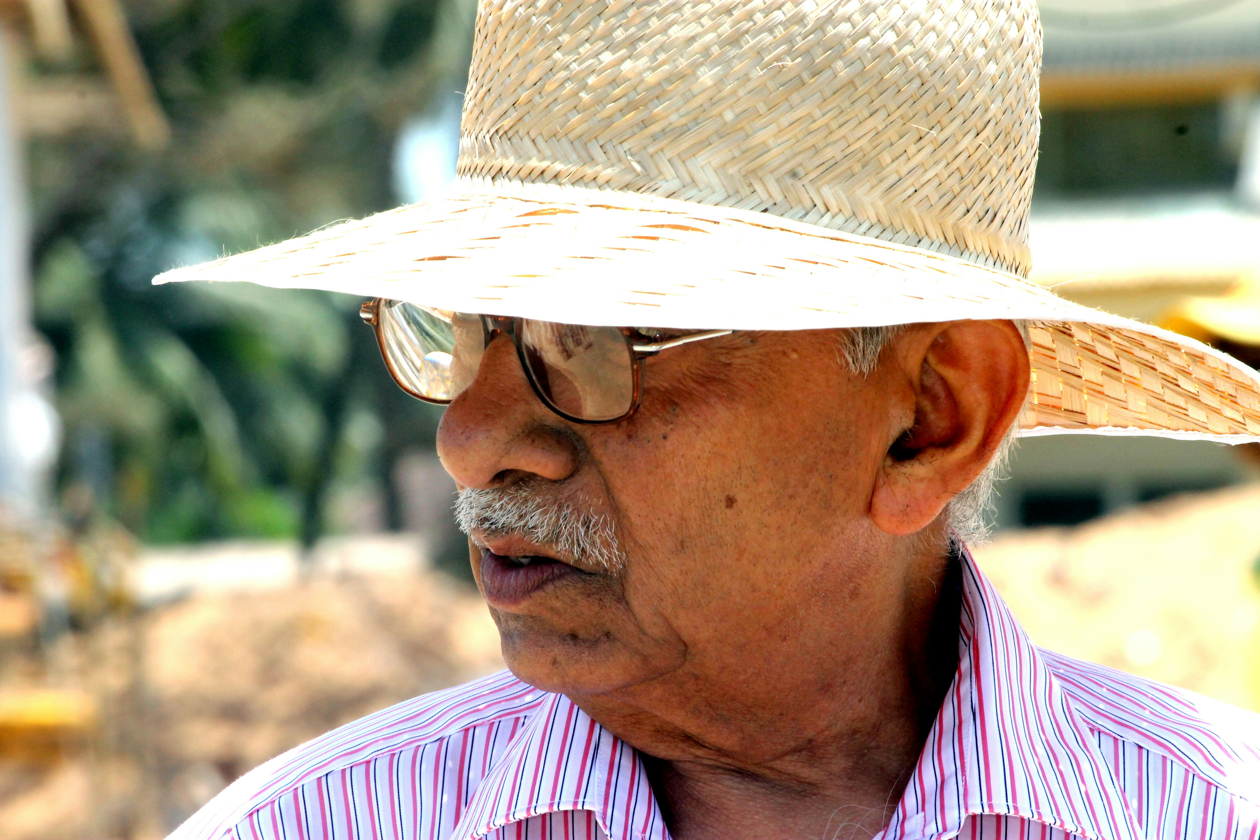 man in white cowboy hat