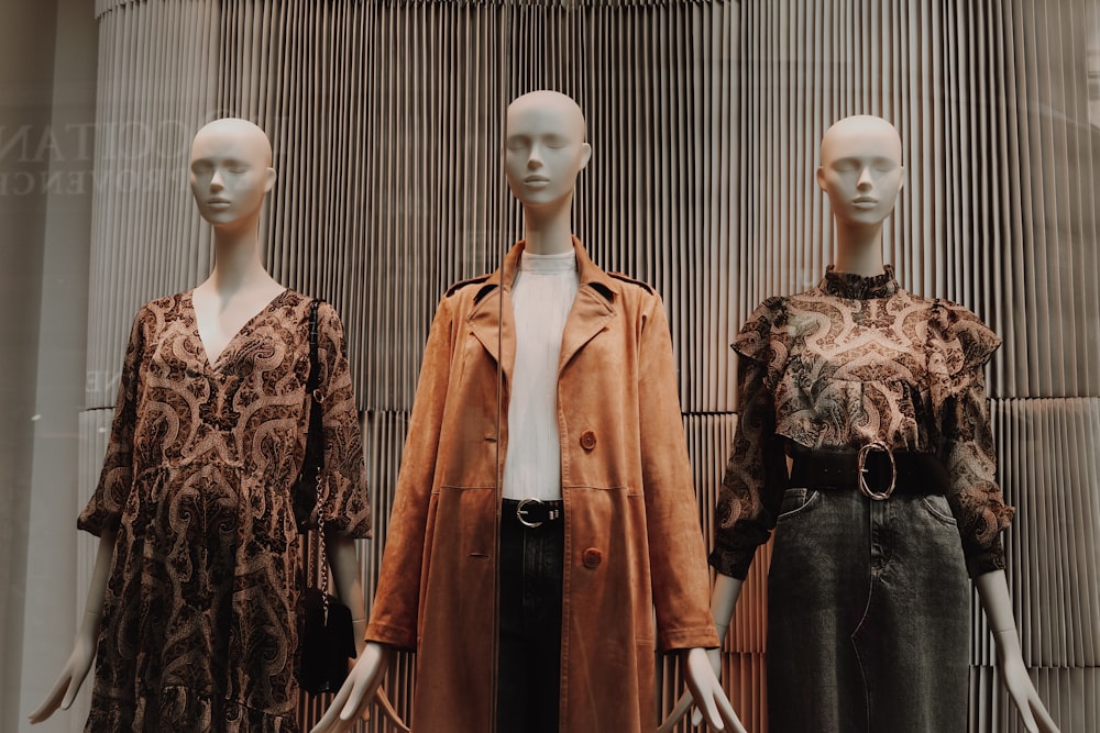 mannequin in brown coat and black skirt