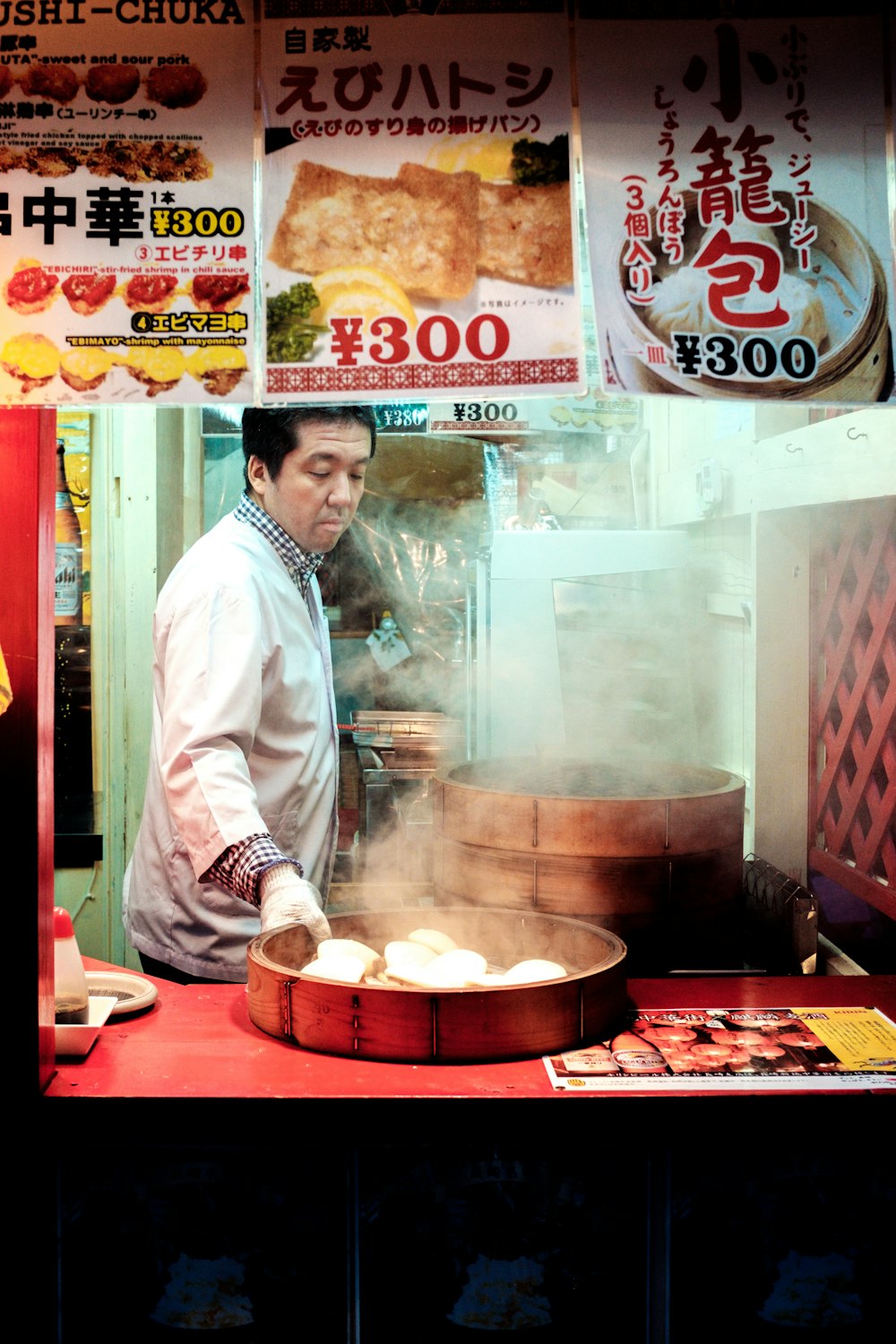 man in white dress shirt cooking