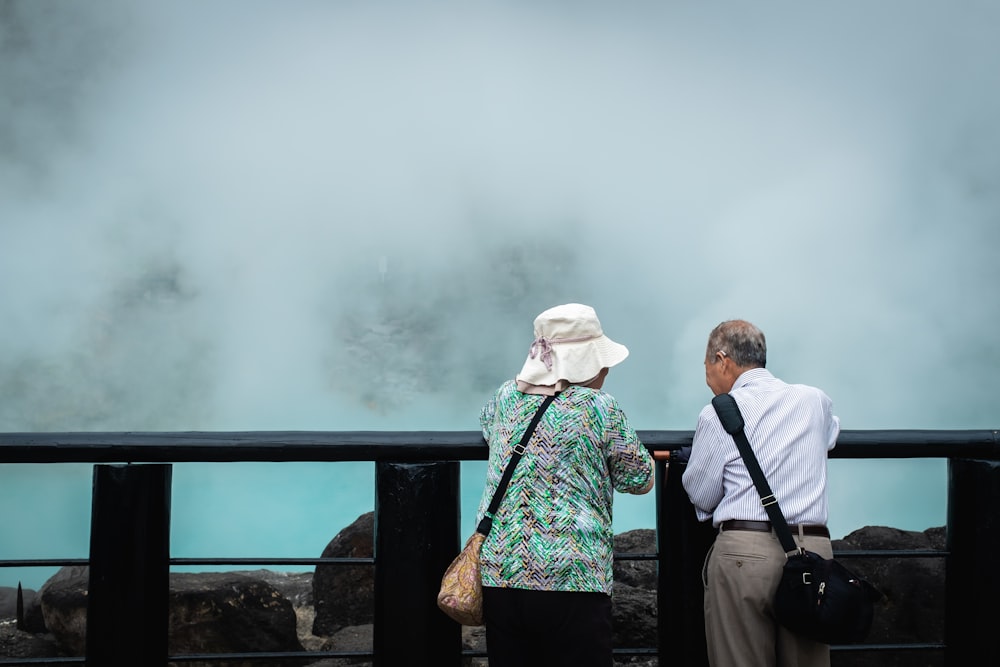 a couple of people standing next to each other