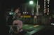 man in black jacket sitting on chair playing saxophone
