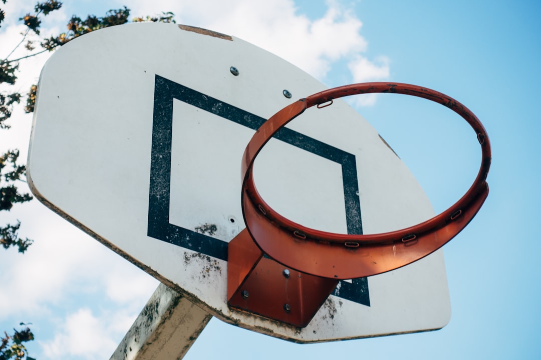 white and orange basketball hoop