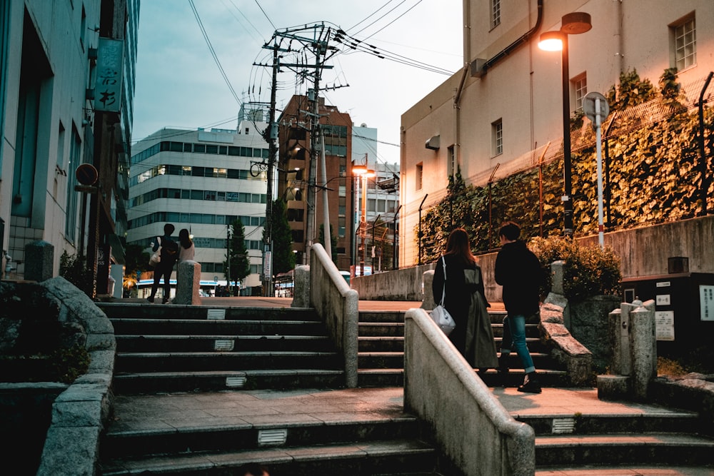 people walking on sidewalk during daytime